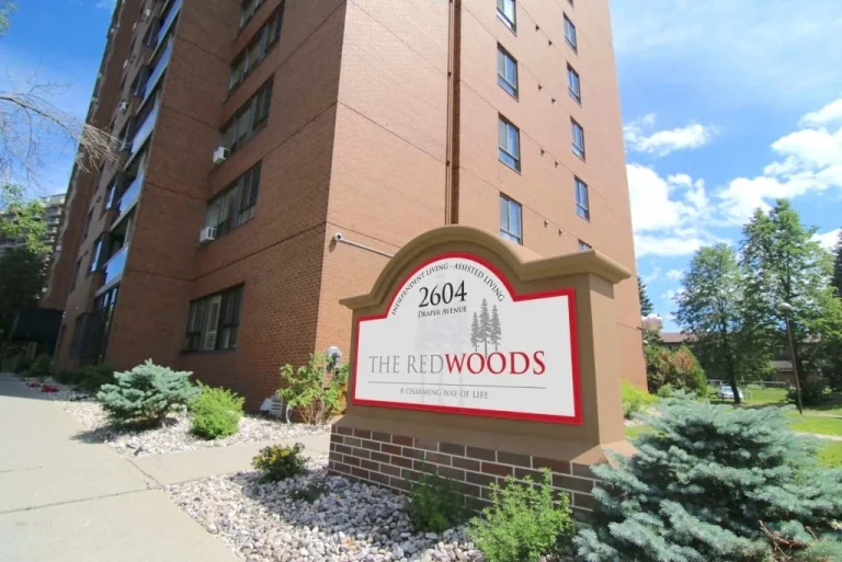 The front entrance to The Redwoods Retirement Community, which offers independent living and assisted living in Ottawa. The Redwoods looks like an apartment building, with most suites having private balconies.